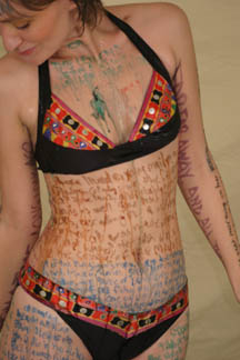 Rinsing off with a bottle of Poland Spring.