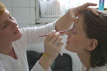 By having pupils painted on her eyelids, Anna could feign enthusiasm while catching up on sleep.