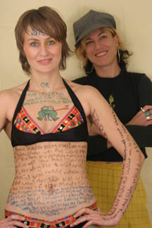 Shelley was reading a funny joke written on Anna's shoulder blade.